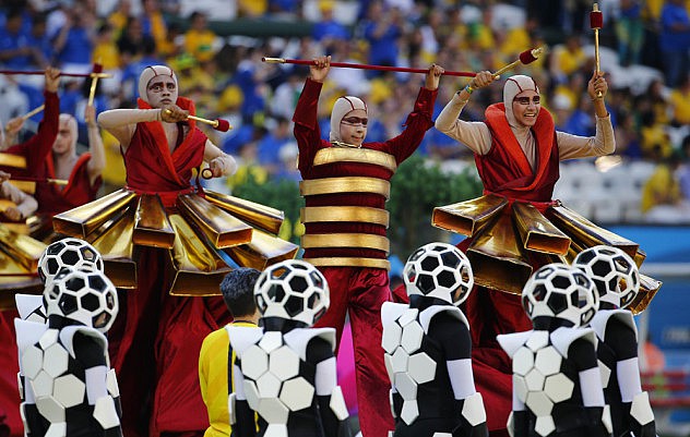 Performers dance during the opening ceremony of the 2014 World Cup at the Corinthians arena in Sao Paulo