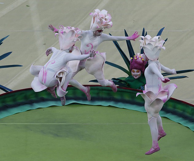 Performers jump on a trampolin during the 2014 World Cup opening ceremony in Sao Paulo