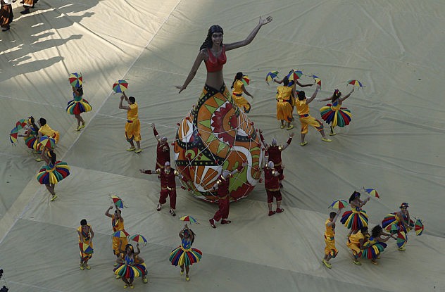 Performers dance during the 2014 World Cup opening ceremony at the Corinthians arena in Sao Paulo