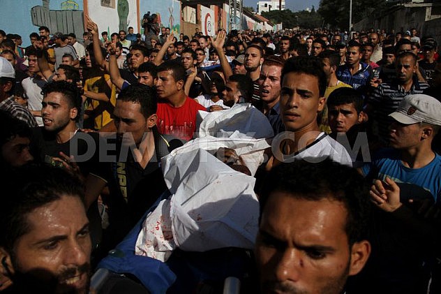 1405532051-palestine-mourns-death-of-4-children-killed-in-israeli-attack-on-beach_5279473