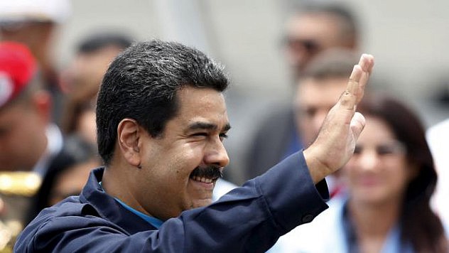Venezuela's President Maduro waves after his arrival in Panama City
