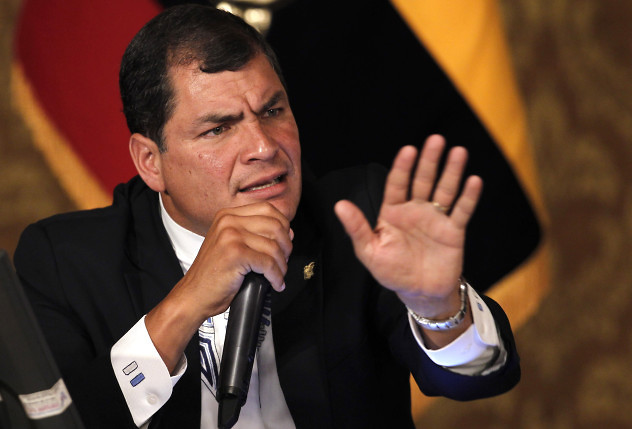 Ecuador's President Rafael Correa speaks during a meeting with the foreign press corps at government palace in Quito, Ecuador, Wednesday, Feb. 20, 2013. Correa talked about Sunday's election results in which he secured a landslide second re-election and also announced that he plans to visit the ailing Venezuelan President Hugo Chavez. (AP Photo/Dolores Ochoa)