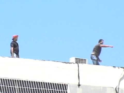 Fascistas disparando desde azoteas de Alta Vista a Marcha de Trabajadores 19-02-2014