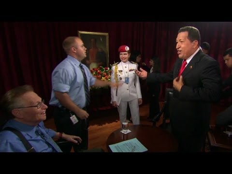 2009: Hugo Chavez sings with Larry King