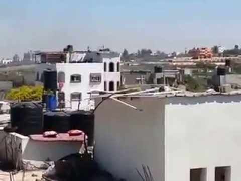 Israel Mortar Hitting Roof of Gaza Building To Warn of imminent Israeli Strike