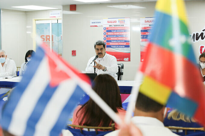 Flags of Cuba and Venezuela flying at the event. Photo: Presidential Press.